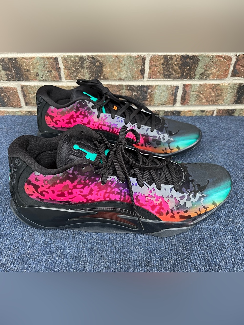 Nike Black Sneaker Tongue with Pink Text and Orange Interior